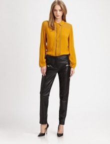 Command attention in glossy leather pants with zippered slash pockets and edgy back cuffs. THE FITMedium rise, about 9½Inseam, about 27THE DETAILSHook-and-eye closureZip flyZippered front slash pocketsZippered back cuffsLeatherDry clean with leather specialistImportedModel shown is 5'9 (175cm) wearing US size 0.