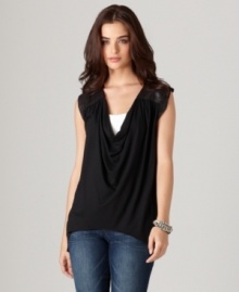 Add a rock and roll edge to any outfit with this petite layering essential from DKNY Jeans. Faux leather panels at the shoulder add structure to the relaxed fit. (Clearance) Add a rock and roll edge to any outfit with this petite layering essential from DKNY Jeans. Faux leather panels at the shoulder add structure to the relaxed fit. (Clearance)