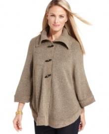 Feel cozy and cute in this petite poncho from Karen Scott! Feel cozy and cute in this petite poncho from Karen Scott!