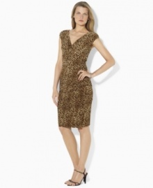 Delicate ruching accents Lauren by Ralph Lauren's feminine stretch jersey petite dress, beautifully crafted with a flattering crossover neckline and empire waist for timeless elegance. Delicate ruching accents Lauren by Ralph Lauren's feminine stretch jersey petite dress, beautifully crafted with a flattering crossover neckline and empire waist for timeless elegance.