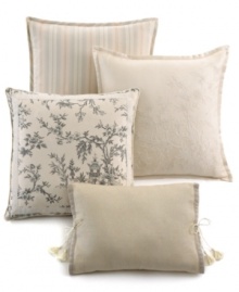 Refined tradition. Elegant velvet ribbon and tassel detailing add touches of modern romance to this cream cotton decorative pillow from Lauren by Ralph Lauren.