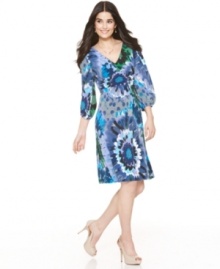 NY Collection crafted this dress with a beautiful floral print and other florid flourishes, like bishop sleeves and a ruched empire waistband. NY Collection crafted this dress with a beautiful floral print and other florid flourishes, like bishop sleeves and a ruched empire waistband.