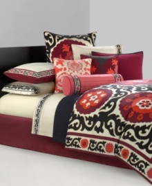 Evoking a traditional look with a modern touch, this Samarkand comforter set from N Natori takes inspiration from the ancient Eastern city of the same name. This Asian-themed set boasts an abstract floral and flourish motif in rich reds and oranges for a statement-making look in the bedroom.