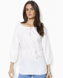 This breezy Lauren by Ralph Lauren petite tunic is rendered in lightweight linen with delicate embroidery and smocking at the neckline for a bohemian look. (Clearance) This breezy Lauren by Ralph Lauren petite tunic is rendered in lightweight linen with delicate embroidery and smocking at the neckline for a bohemian look. (Clearance)