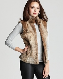 Plush rabbit fur lends undeniable glamour to this MICHAEL Michael Kors Petites vest--a luxe statement for the new season.