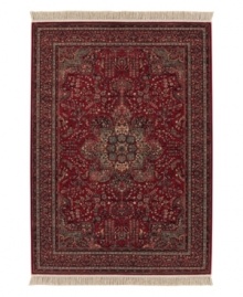 The Couristan Kashimar collection features designs inspired by Oriental and Persian motifs. While each pattern is painstakingly crafted to emulate the classic design traits of long ago, the colors of Kashimar reflect the most popular looks of today. With features like 100% New Zealand semi-worsted wool, Couristan's exclusive locked in weave, crystal-point finish and hand-knotted fringes, the Medallion Antique Red rug offers a richly detailed design and warm red and grey floral details, a sophisticated addition to any room of your home.
