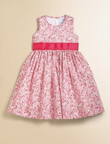 A beautiful Liberty floral from England looks lovely in a full frock with wide grosgrain ties.Round necklineSleevelessEmpire waist with grosgrain ribbon back tiesBack button closeFull skirtCotton liningCottonMachine washImported Please note: Number of buttons may vary depending on size ordered. A beautiful Liberty floral from England looks lovely in a full frock with wide grosgrain ties.Round necklineSleevelessEmpire waist with grosgrain ribbon back tiesBack button closeFull skirtCotton liningCottonMachine washImported Please note: Number of buttons may vary depending on size ordered.