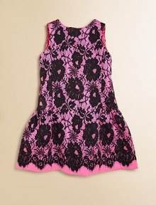 A dramatic silhouette finished with romantic details like a gorgeous back bow and allover lace print.Jewel necklineSleevelessConcealed back zip closureBack bow detailDrop waist skirt56% wool/44% silkDry cleanMade in USA of imported fabric A dramatic silhouette finished with romantic details like a gorgeous back bow and allover lace print.Jewel necklineSleevelessConcealed back zip closureBack bow detailDrop waist skirt56% wool/44% silkDry cleanMade in USA of imported fabric