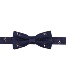 Crafted in fine silk for the superbly dress young man. He'll don his Tommy Hilfiger bow tie proudly all winter long. Crafted in fine silk for the superbly dress young man. He'll don his Tommy Hilfiger bow tie proudly all winter long.