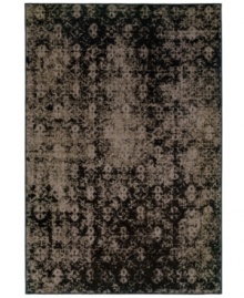 Distressed never looked so rich. The Revamp area rug from Sphinx takes a repeating historic medallion motif and updates its heirloom appeal with modern, faded styling. Created in the USA of ultra-tough, hard-twist polypropylene. Distressed never looked so rich. The Revamp area rug from Sphinx takes a repeating historic medallion motif and updates its heirloom appeal with modern, faded styling. Created in the USA of ultra-tough, hard-twist polypropylene.