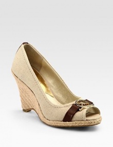 Fronted by contrasting leather trim and a goldtone MK, this textured linen silhouette concludes with a timeless espadrille wedge and peep toe. Braided hemp wedge, 4 (100mm)Linen and leather upperLeather liningRubber solePadded insoleImported