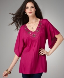 This Style&co. top lends a little world flair to your wardrobe. The beaded neckline and tunic silhouette make it a chic match with skinny pants, too! (Clearance)