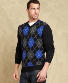 This argyle v-neck sweater from Tommy Hilfiger combines classic and preppy for a modern take on tradition. This argyle v-neck sweater from Tommy Hilfiger combines classic and preppy for a modern take on tradition.
