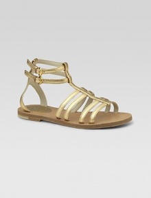 Graceful straps of gleaming gold leather are a modern and elegant look for sandal weather.Leather upperDouble buckle ankle strapsGolden hardwareLeather sole with non-slip rubber finishMade in Italy Graceful straps of gleaming gold leather are a modern and elegant look for sandal weather.Leather upperDouble buckle ankle strapsGolden hardwareLeather sole with non-slip rubber finishMade in Italy