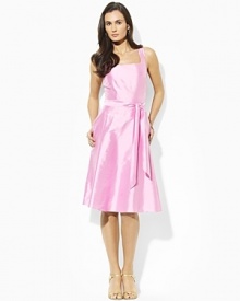 The perennially chic Kelwin dress exudes timeless femininity in lustrous silk dupioni with a chic scoop neckline and a graceful full skirt. The perennially chic Kelwin dress exudes timeless femininity in lustrous silk dupioni with a chic scoop neckline and a graceful full skirt.