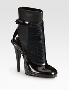 Glossy patent leather, ultra-soft calf hair and matte leather form this tall silhouette hitting above the ankle. Stacked heel, 4½ (115mm)Calf hair, leather and patent leather upperPatent leather strap with snap closureLeather lining and solePadded insoleMade in Italy