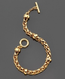 A timeless accent piece, this beautiful Lauren Ralph Lauren toggle bracelet features antique goldtone plating and a delicate woven design. Approximate length: 8 inches.