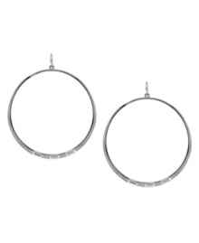 Geometric glam, by Vince Camuto. These classic hoop earrings have been upgraded with rectangular stud detail at the bottom. Crafted in silver tone mixed metal. Approximate drop: 2-1/2 inches.