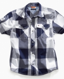 Dial up some warm-weather style with this short-sleeved plaid shirt from Tommy Hilfiger. Dial up some warm-weather style with this short-sleeved plaid shirt from Tommy Hilfiger.