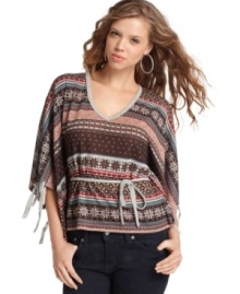 Fair Isle knit gets a modern makeover from Almost Famous! With cute fringe details and soft drape, this poncho is perfect for layering.