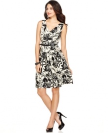 This floral-printed frock from Evan Picone sees you easily from day to night--simply switch your nine-to-five flats for a heel when heading to dinner. This floral-printed frock from Evan Picone sees you easily from day to night--simply switch your nine-to-five flats for a heel when heading to dinner.