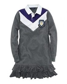 A preppy drop-waist rugby dress in stretch cotton interlock is accented with bold chevron stripes for a sporty look. A preppy drop-waist rugby dress in stretch cotton interlock is accented with bold chevron stripes for a sporty look.