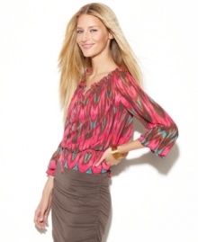 A tribal print gives INC's petite peplum peasant top a boho-glam look! Pair it with dramatic earrings for the finishing touch. A tribal print gives INC's petite peplum peasant top a boho-glam look! Pair it with dramatic earrings for the finishing touch.