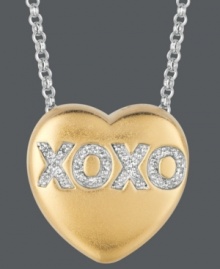 Say it from the heart. Sweethearts' adorable heart-shaped pendant expresses more that just great style with the letters XOXO written in round-cut diamonds (1/10 ct. t.w.) across the surface. Pendant crafted in 14k gold over sterling silver and sterling silver. Copyright © 2011 New England Confectionery Company. Approximate length: 16 inches + 2-inch extender. Approximate drop: 5/8 inch. Say it from the heart. Sweethearts' adorable heart-shaped pendant expresses more that just great style with the letters XOXO written in round-cut diamonds (1/10 ct. t.w.) across the surface. Pendant crafted in 14k gold over sterling silver and sterling silver. Copyright © 2011 New England Confectionery Company. Approximate length: 16 inches + 2-inch extender. Approximate drop: 5/8 inch.