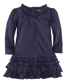 A comfortable drop-waist dress in soft cotton jersey is finished with a ruffled neckline and skirt for a girly look. A comfortable drop-waist dress in soft cotton jersey is finished with a ruffled neckline and skirt for a girly look.