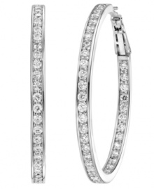 Statement-making shine. These stunning hoop earrings by CRISLU are perfect for the red carpet, or a trip to the store. Crafted in platinum-plated sterling silver, earrings feature an in-and-out-design decorated by round-cut cubic zirconias (1-1/2 ct. t.w.). Approximate diameter: 1-1/3 inches.