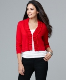 This petite ruffled cardigan makes an extra feminine (and extra flattering) layer to any pants ensemble or atop your favorite dress. This petite ruffled cardigan makes an extra feminine (and extra flattering) layer to any pants ensemble or atop your favorite dress.
